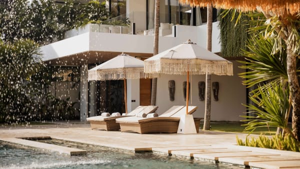 Elite Havens - Villa Nica Bali Indonesia - Restful sun loungers by the pool